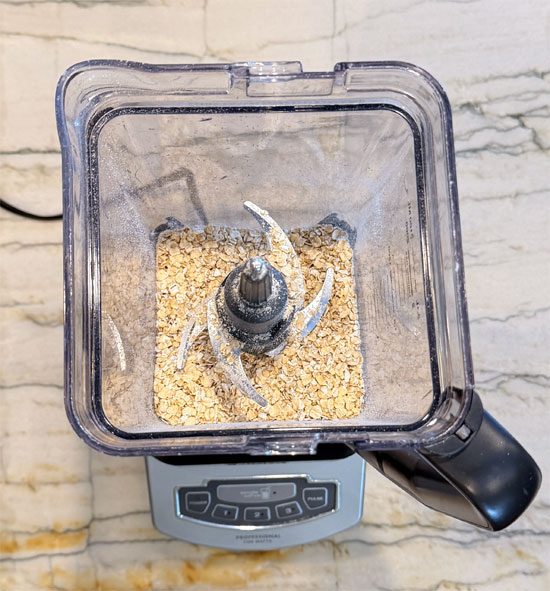 Blend the oats: Add 2 cups quick oats to a blender and blend until it reaches a fine flour consistency.