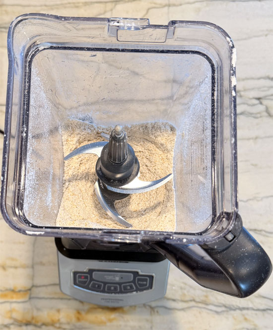 Add dry ingredients: Protein powder, cinnamon, nutmeg, salt, monk fruit, allulose and baking powder and blend for 10 more seconds to combine.