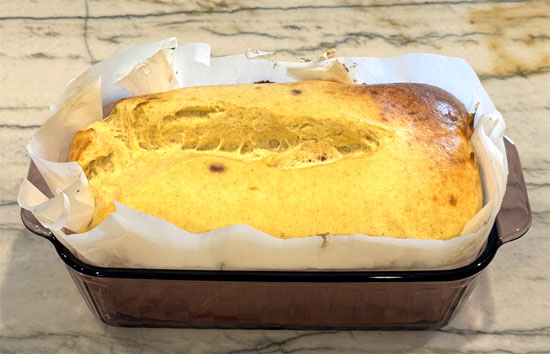 Bake for 70 minutes, or until the top is golden brown and a toothpick inserted in the center comes out clean.