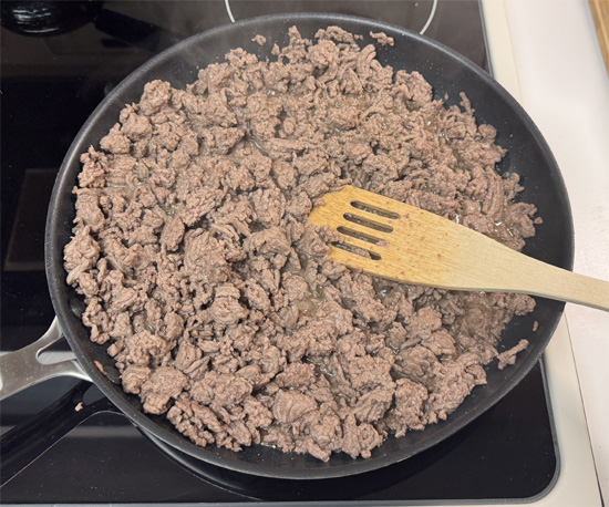 Cook for 7–10 minutes, stirring occasionally, until the beef is browned and no longer pink.