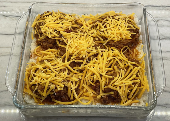 Top with the remaining shredded cheddar cheese. 