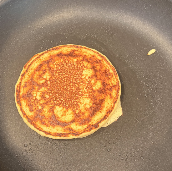 Cook until bubbles form on the surface (about 30–35 seconds). Flip and cook for another 30–35 seconds, until lightly golden.