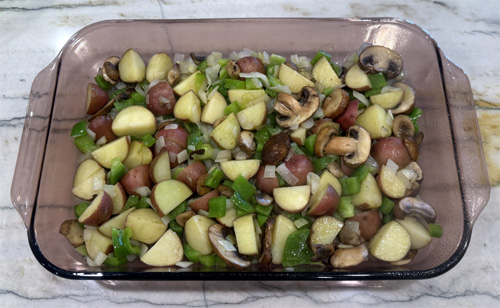 Remove the vegetables from the heat and pour into the casserole dish.