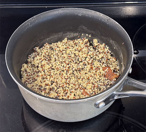 After 15 minutes, take the pan off the heat and let it sit for 5 more minutes, or until the almond milk is absorbed and the quinoa is cooked.
