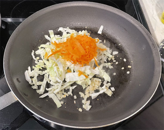 Cabbage and Carrot Added to Pan