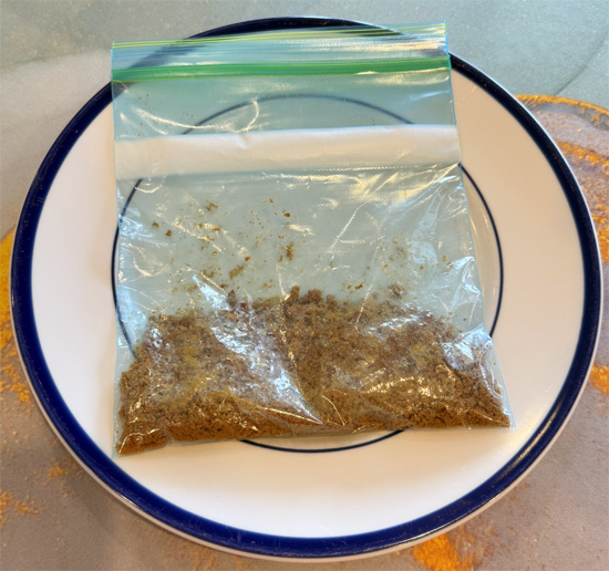 Crush the Biscoff cookies, then divide that between the two bowls.