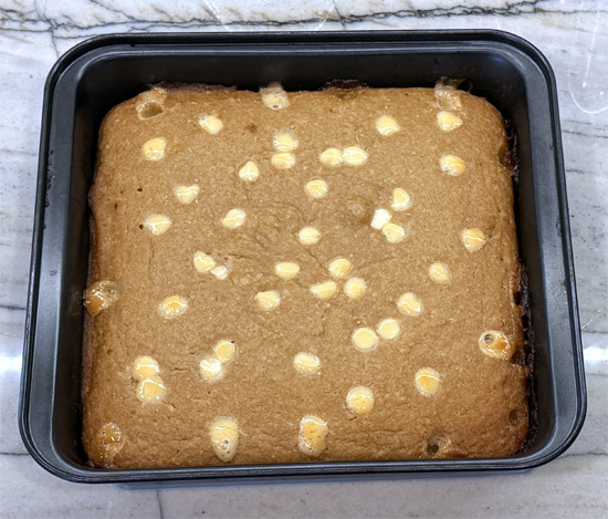 Return the pan to the oven and bake for another 20 minutes, until a toothpick comes out with moist crumbs rather than wet batter.
