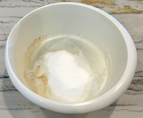 While the eggs are sitting, whisk together the next four ingredients: milk, brown sugar replacement, Splenda and vanilla. Then, whisk in the cocoa and set aside.