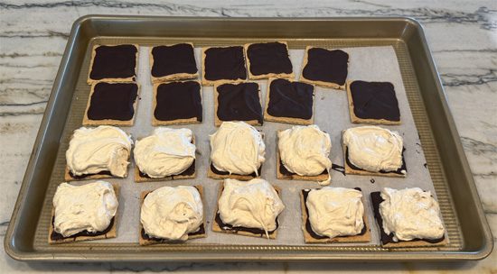 Assemble sandwiches: Remove crackers from freezer. Divide the Cool Whip mixture evenly among the 10 chocolate-covered crackers. 
