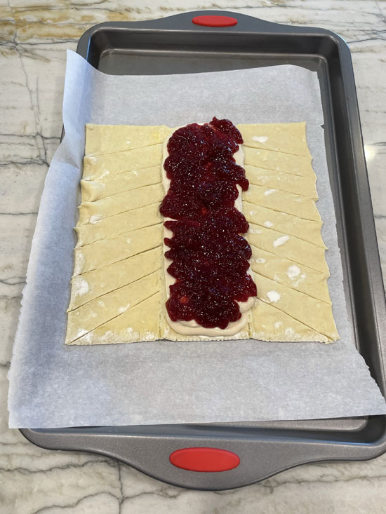 Slice the edges of the pastry sheet about 1-inch apart.