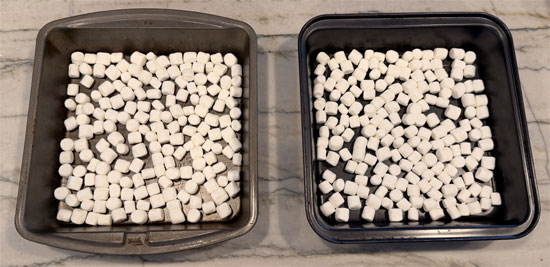 Cover the bottoms of two 8x8 pans with the mini marshmallows. 