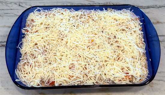 Sprinkle the two cheeses over the top.