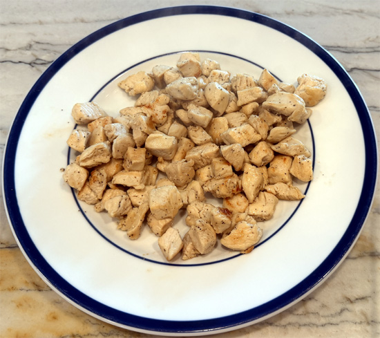Stir the chicken and continue cooking for 4 to 6 minutes, until the pieces are browned and reach 165°F; remove the skillet from the heat and set the chicken aside.