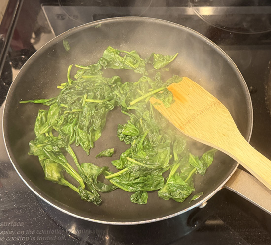 Put the skillet back on medium-high heat and cook the spinach until wilted, about 1-2 minutes. Set aside. 