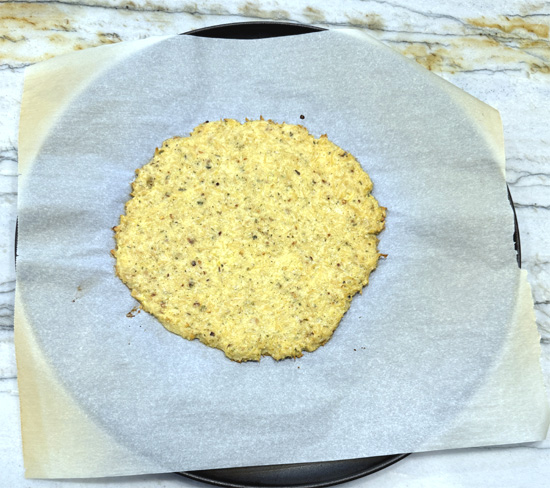 Bake the crust for 15 to 20 minutes, until it's firm and golden on the edges. 