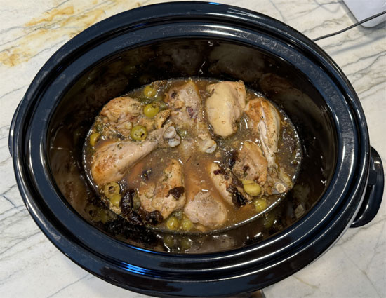 Mix in the prune and olives, then lay the chicken on top in an even layer.