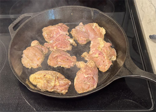 Sear Chicken: Heat olive oil in a large oven-safe skillet or Dutch oven over medium-high heat. Add seasoned chicken and sear for 2 minutes on each side. Remove from heat and set aside.