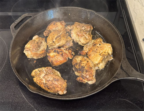 Sear Chicken: Heat olive oil in a large oven-safe skillet or Dutch oven over medium-high heat. Add seasoned chicken and sear for 2 minutes on each side. Remove from heat and set aside.