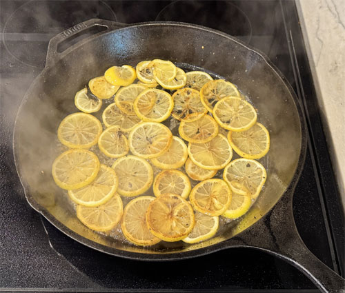 Caramelize Lemons: In the same pan, add lemon slices and cook until caramelized and softened, about 1½ minutes per side. Remove and set aside.