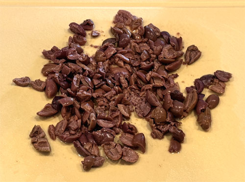 Sauté Aromatics: Reduce heat to medium-low. Add olives, garlic, shallots, and the remaining spice mix to the pan. Cook for 2-3 minutes until fragrant, scraping up any browned bits from the pan.