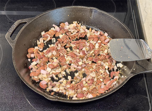 Sauté Aromatics: Reduce heat to medium-low. Add olives, garlic, shallots, and the remaining spice mix to the pan. Cook for 2-3 minutes until fragrant, scraping up any browned bits from the pan.