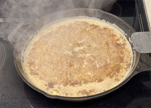 Add rice and chicken broth to the pan. Stir, bring to a boil (about 5 minutes), then remove from heat.