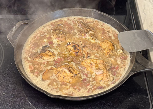 Assemble Dish: Nestle the seared chicken back into the pan, placing lemon slices on top. Cover with a lid or foil.