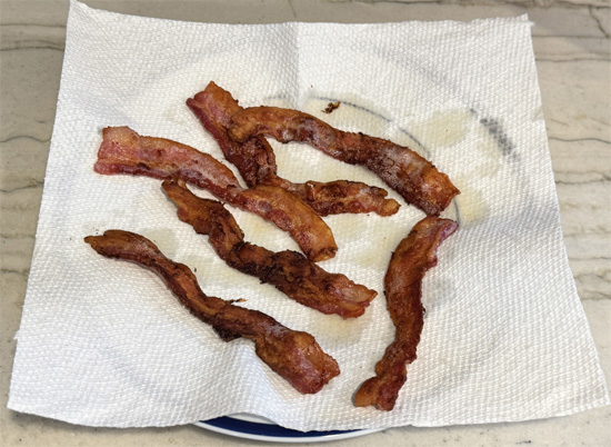 Heat a large skillet over medium-high heat and cook the chopped bacon until browned and crispy, about 5-7 minutes. Place the cooked bacon on a paper towel-lined plate. Set aside to cool.