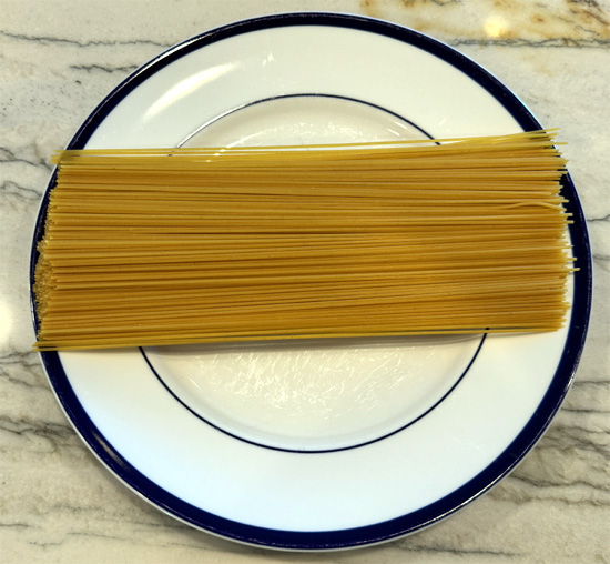 Meanwhile, cook the spaghetti noodles according to the package directions until al dente. Drain and set aside. 