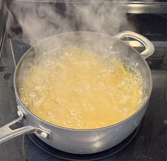 Meanwhile, cook the spaghetti noodles according to the package directions until al dente. Drain and set aside. 