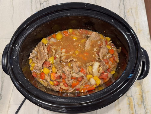 Cover and cook on Low for 4–6 hours or High for 2–3 hours, until the beef is tender and the flavors have melded.