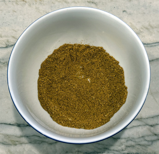 Mix the spices together in a small bowl, coriander, celery seed, cumin, garam masala and turmeric. Set the bowl aside. 