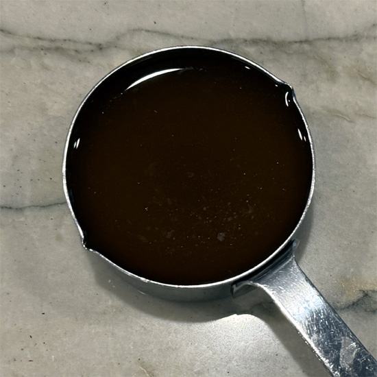 Pour in the tomatoes, coconut milk, vegetable broth (or water) and lentils.