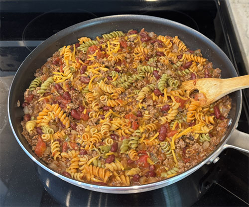 Stir the cheese into the mix and serve. 