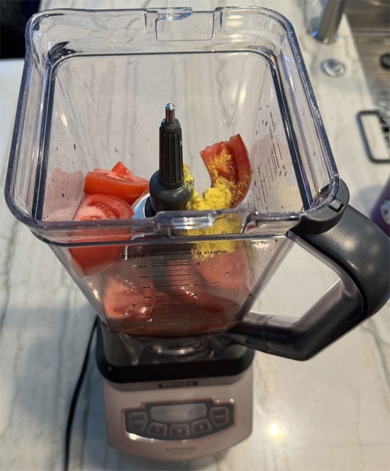 Put 3 tomatoes, 2 teaspoons minced garlic, 1 cup of chicken broth and bouillon in a blender and mix well, about 45 seconds to a minute. Then, pour that mixture into the pan you boiled the peppers in. 