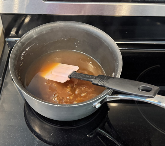 Slowly stir the cornstarch and water mixture into the broth. Keep stirring until the broth thickens, about 2 minutes. Then, set aside and keep warm.
