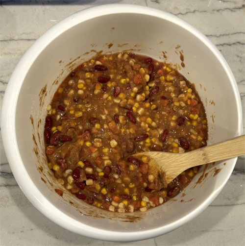 Then, fold in the kidney beans and the frozen corn.