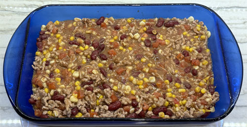 Pour the remaining mixture into the baking dish.