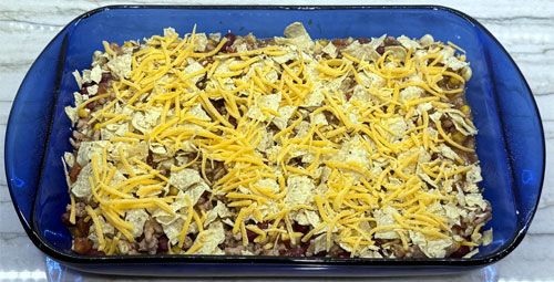 Sprinkle the remaining cheddar cheese over the top.