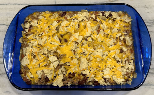Bake the casserole until the mixture is bubbling and the cheese is slightly browned, about 15 to 20 minutes.