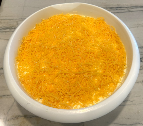 Sprinkle the cheese over the top, cover, and refrigerate for 12 hours or overnight.