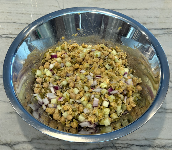 Add the chopped cucumber, relish, onion and mix them together.