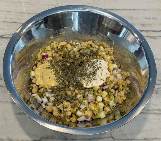 Stir in the remaining ingredients: mustard, mayonnaise, parsley, basil, balsamic, soy sauce and black pepper. Mix until combined.