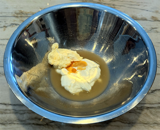In a separate bowl, whisk together the Greek yogurt, mayonnaise, lime juice, honey, hot sauce, lemon pepper, garlic powder, paprika, and cumin until smooth.