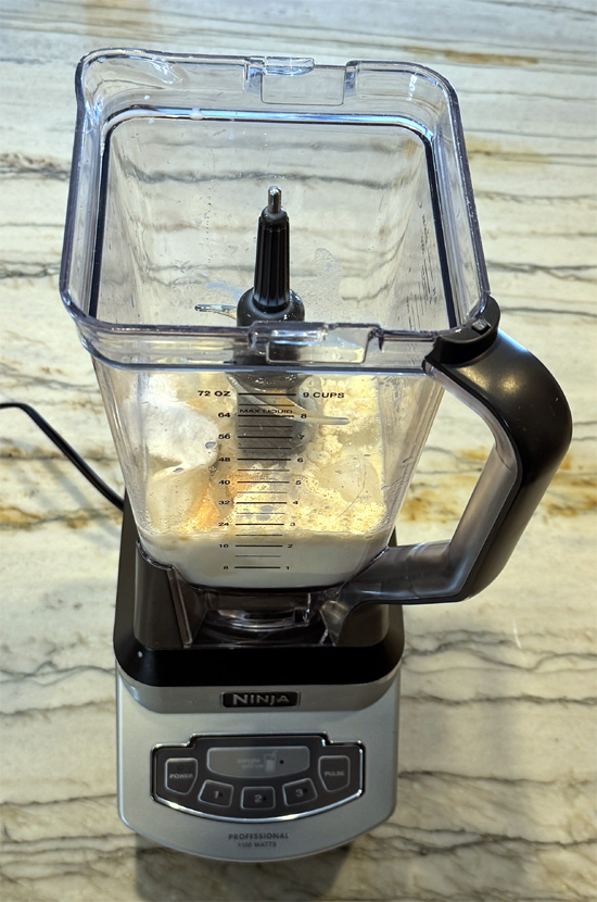 Add all ingredients to a blender.