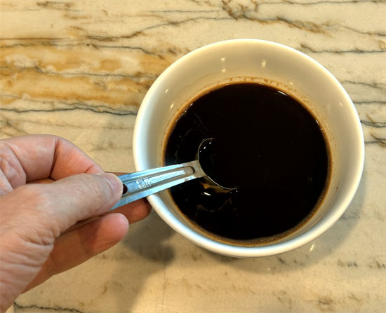 Coffee and water mixed together.