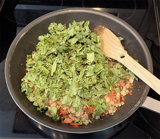Stir the kale in to wilt it. Cook, mixing together for another 2-3 minutes until the kale is wilted and deep green.
