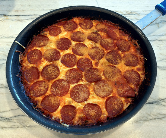 Bake until the cheese is melted and starts to brown and the edges bubble, 15 to 17 minutes.