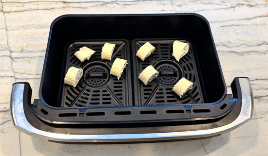 Place the pieces in the air fryer basket and cook at 400°F for 5 minutes.