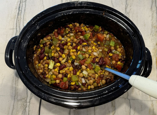 Add the vegetables on top, mix everything together, cover, and cook on high for 2 1/2 to 3 hours.